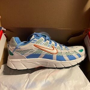 Nike Kids Blue p-6000 and White Sneakers with Orange Swoosh